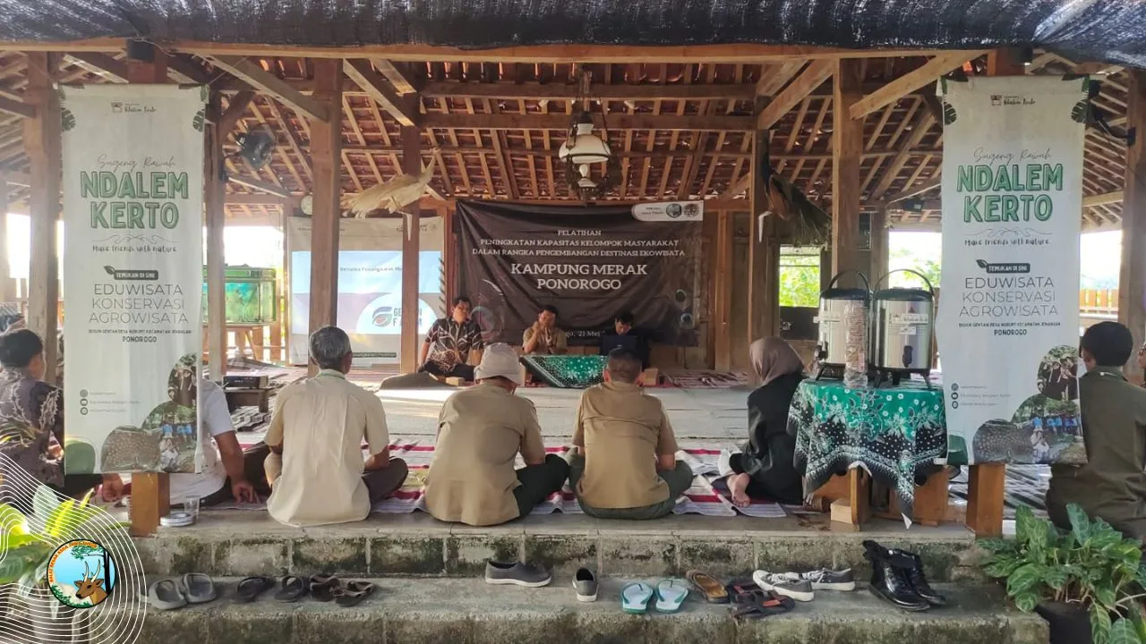Banner Pembentukan Kelompok Masyarakat Kampung Merak Ponorogo