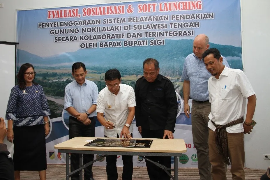 Banner Evaluasi, Sosialisasi, dan Soft Launching Penyelenggaraan Sistem Pelayanan Pendakian Gunung Nokilalaki di Sulawesi Tengah Secara Kolaboratif dan Terintegrasi oleh Bapak Bupati Sigi