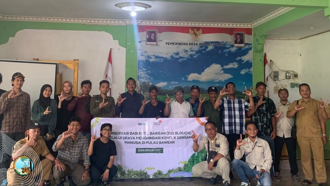 Banner Sosialisasi Babi Kutil, Jembatani Keresahan Masyarakat Bawean
