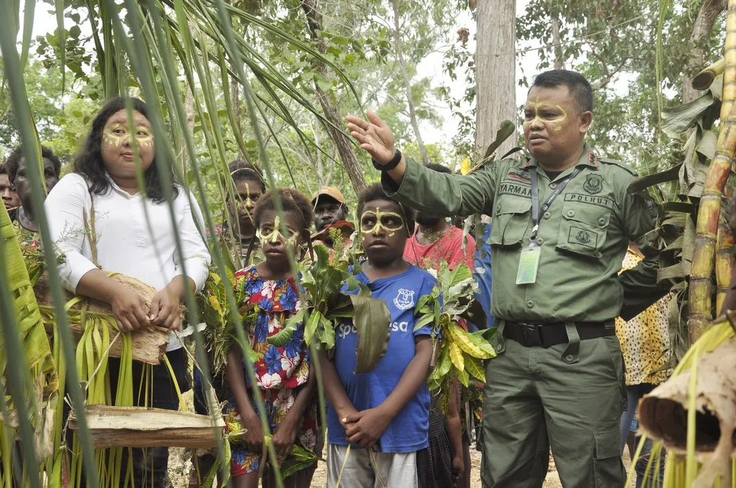 Banner Prosesi Adat Pra Pembangunan Sanctuary Wallaby Lincah Balai TN Wasur